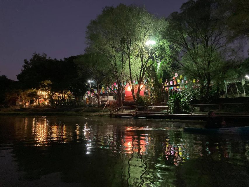 Chiang Mai: Ping River Night Kayaking into City Center - Mai Yai trees, bridges in color, and that drifting restaurant music