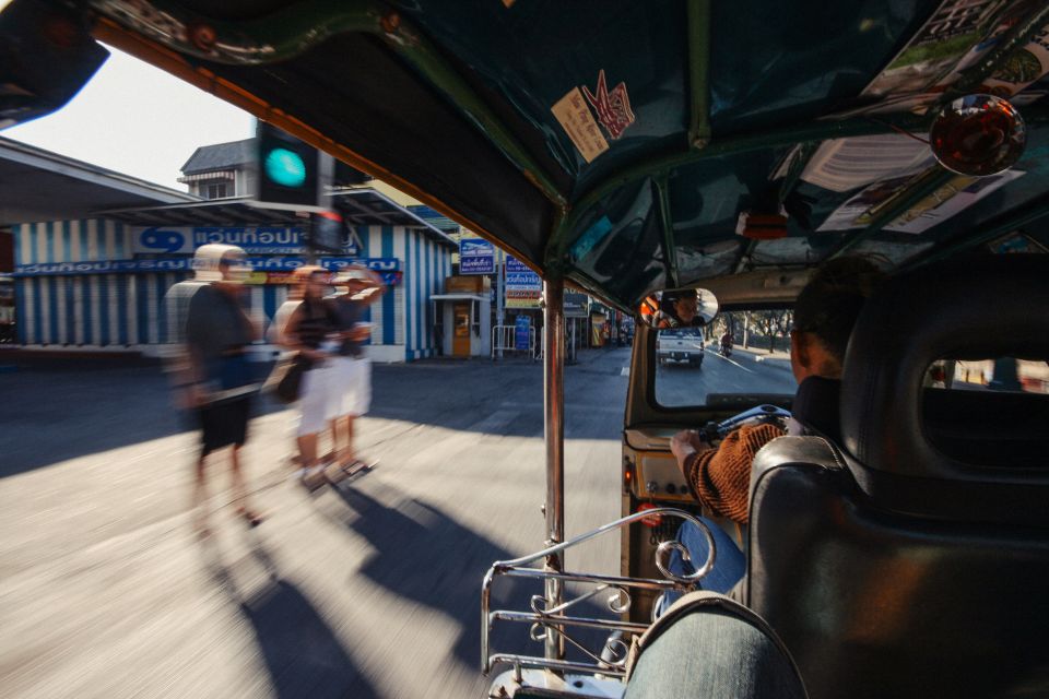 Chiang Mai: Private Tuk Tuk Tour of City Temples With Pickup - Tha Phae Gate: A Landmark With Everyday Life Around It