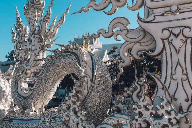 Chiang Rai Famed Temples and Golden Triangle Tour from Chiang Mai - Wat Rong Suea Ten (Blue Temple): Color and Detail in a Short Visit