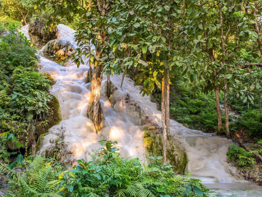 From Chiang Mai: Chiang Dao Cave Trekking Full-Day Tour - Entering the caves: stalactites, shrines, and the cool air shift