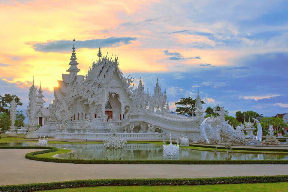 From Chiang Mai: Chiang Rai's Temples Exploration Day Trip - Wat Rong Khun (White Temple): Mirrors, Pond Reflections, and Symbol Sense