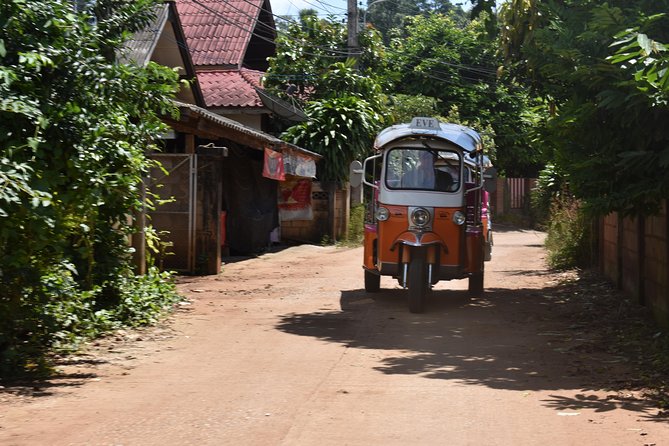 Full-Day Guided Tuk Tuk Chiang Mai Adventure and Rafting - Bamboo rafting downstream: why the river time matters