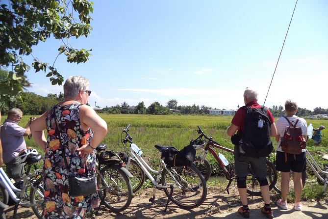 Half-Day Colors of Chiang Mai Biking Tour - Beyond temples: a former leper colony, a hill-tribe school, and a pottery studio