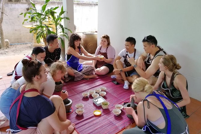Lanna Smile Thai Cooking Class in Chiang Mai with Market tour - Inside the AC cooking studio: small-group stations, clean setup